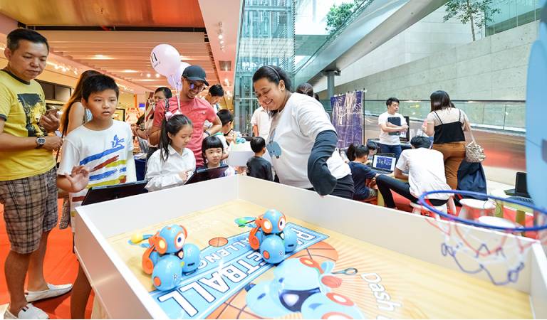 Playing basketball with Dash at the Playventure at Changi Airport in 2018